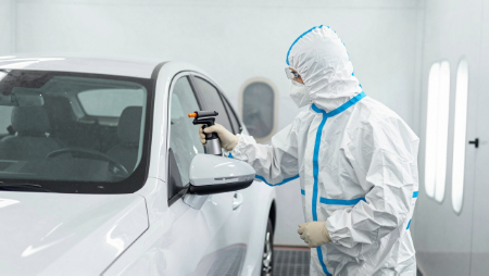 persona pintando un coche en un taller generated with Z-Image