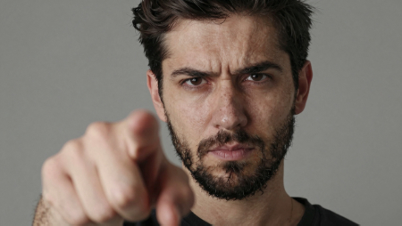 un hombre frunciendo el ceno y senalando a la camara generated with Z-Image