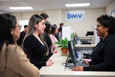 woman speaking with a dmv supervisor image created with Grok AI